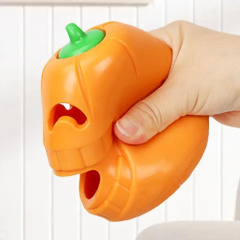 Yellow pumpkin-shaped TPR dog chew toy for aggressive chewers measuring 8.6x11.5 cm
