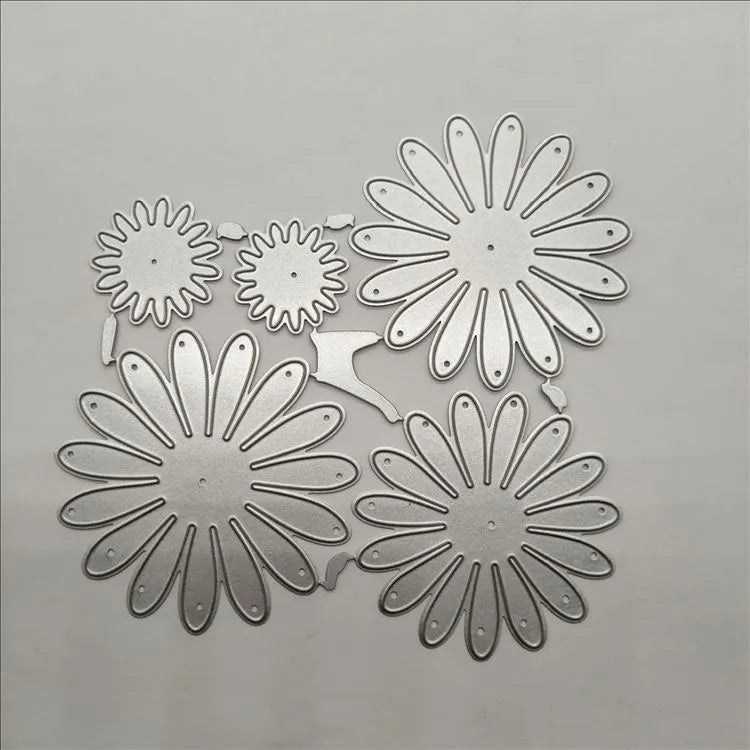 Silver floral design metal cutting die with hanging hook, 12.5cm by 13cm.