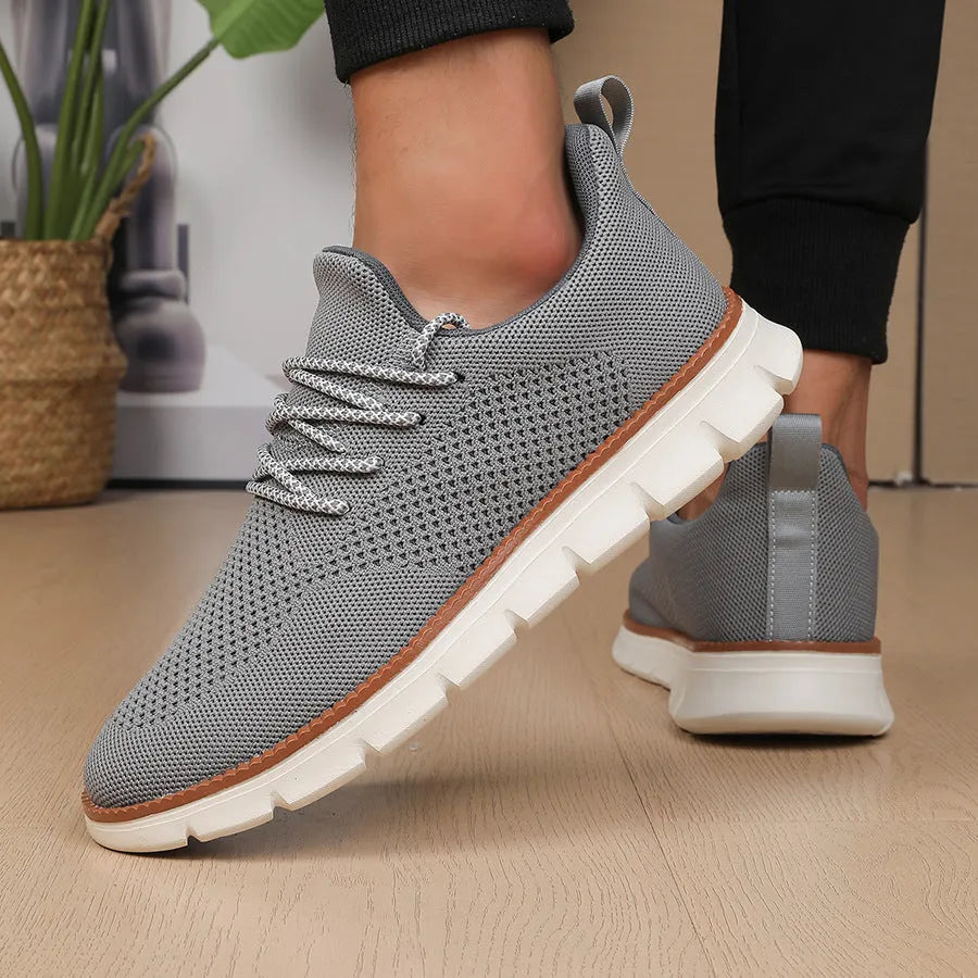 Men's grey and black fly woven mesh sneakers with round toe and low-heel design