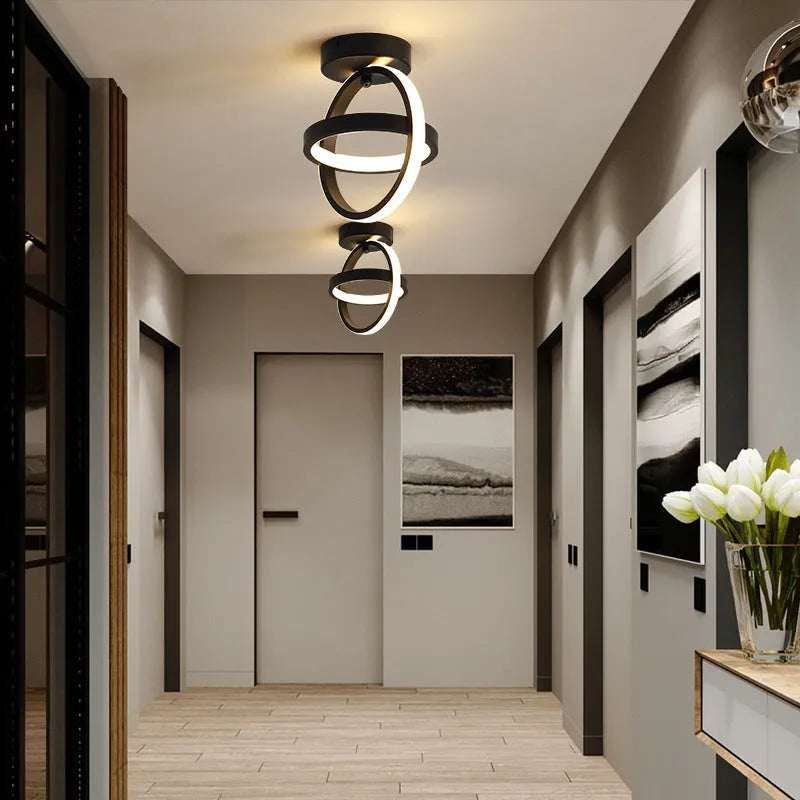 Modern round black ceiling light with white acrylic shade and adjustable tri-colour LED.