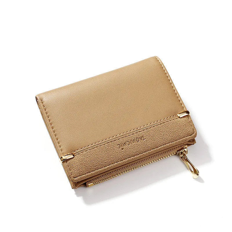 Black ladies wallet showing six internal compartments including photo slot, zipper section, card slots, and hidden compartment