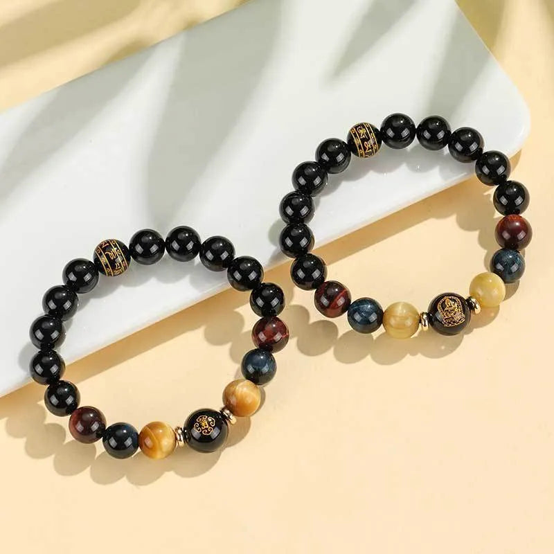 Handmade black agate beaded bracelet with tiger eye stones and Buddhist deity zodiac charms