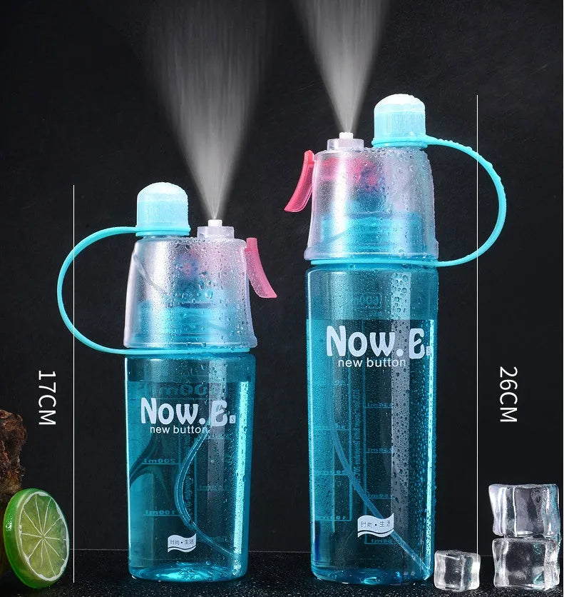 Portable outdoor mist spray water cup with transparent body, handle, and spray nozzle in green colour
