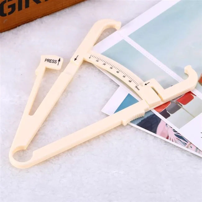 White acrylic fat caliper skin fold thickness meter showing 200mm range and 0.001mm accuracy for body fat measurement