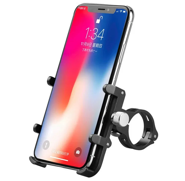 Black aluminium alloy GUB motorcycle phone holder mounted on bicycle handlebars, showing phone clamp.
