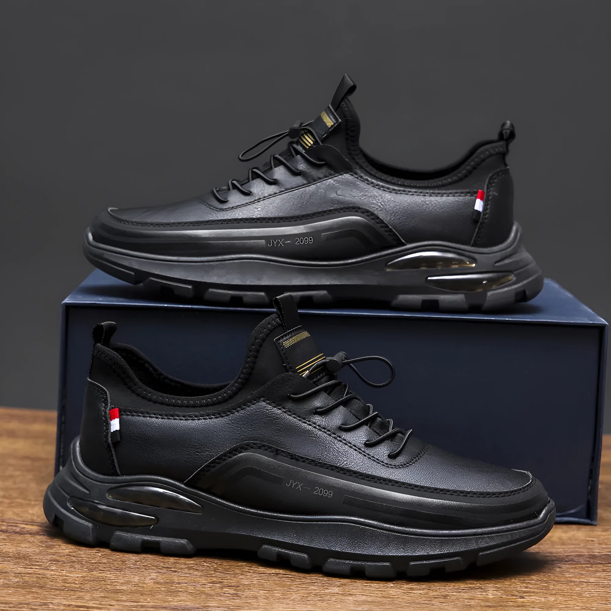 Men's black fleece lined waterproof sneakers with synthetic leather upper and rubber sole