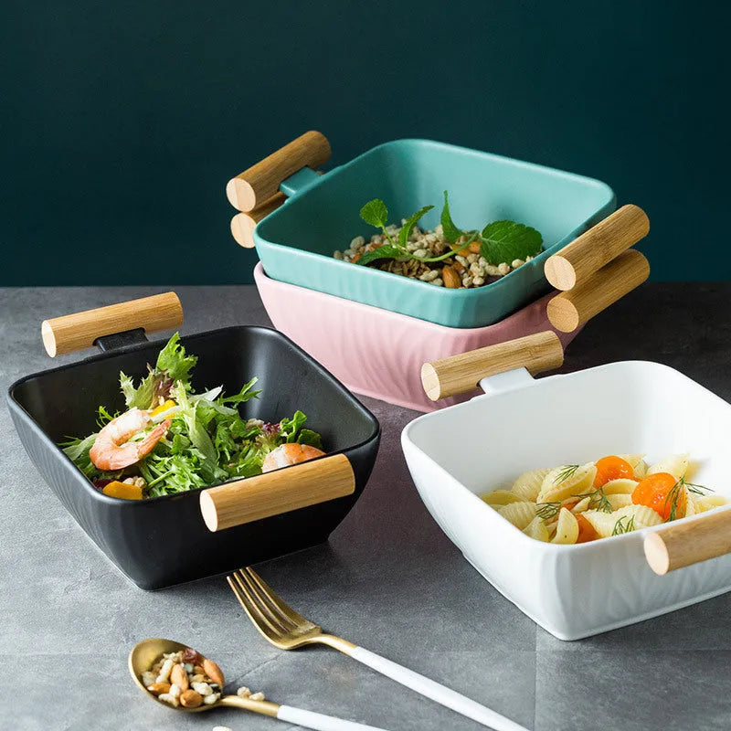 Ceramic serving bowl with lid in irregular modern shape, heat-resistant porcelain construction