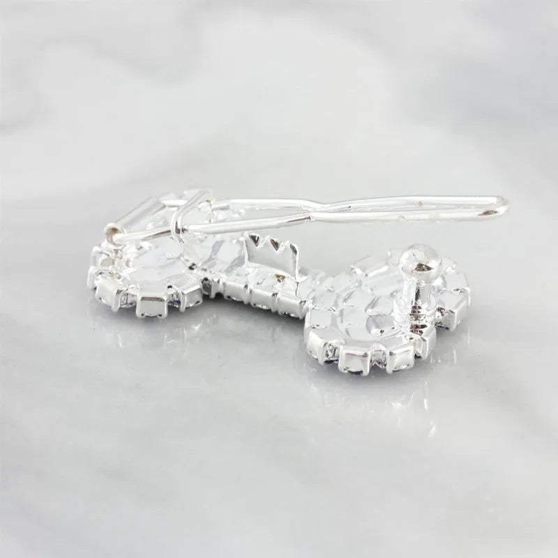 Diamond dog bone pet barrette in size S, shown in white, pink, blue and red for cats and dogs