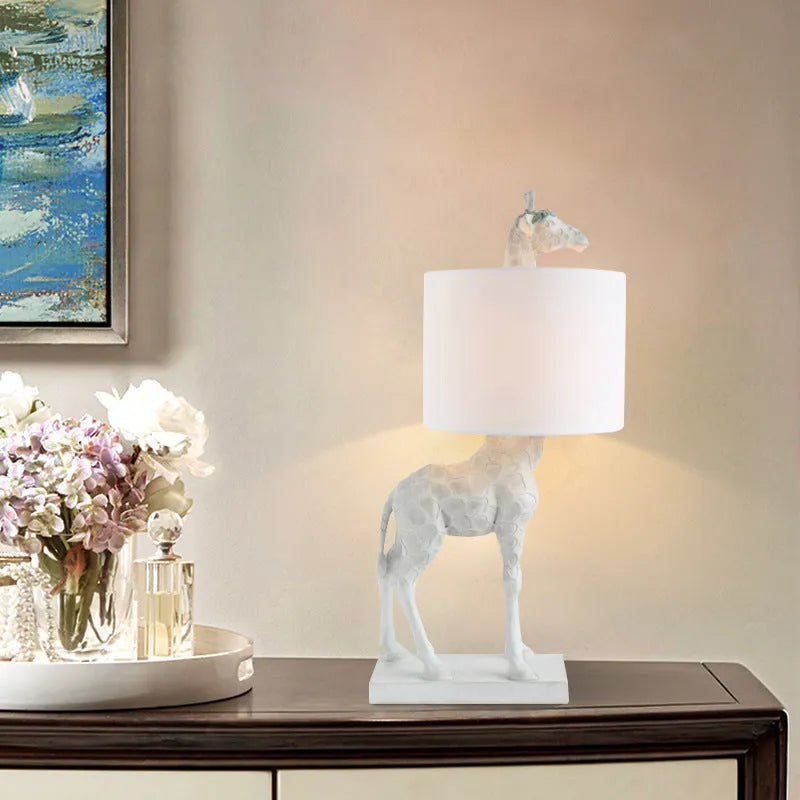 White or gold giraffe table lamp 66cm tall with fabric shade