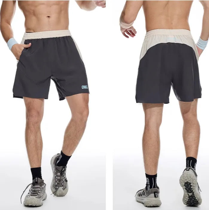 Men's loose fit workout shorts with elastic lace-up waist in Dark Rock Ash colour, shown during weightlifting exercise
