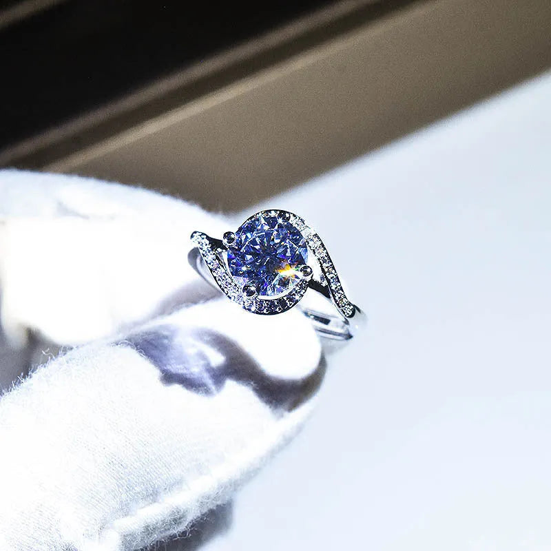 Silver geometric angel eyes women's ring with adjustable opening and textured moissanite centrepiece