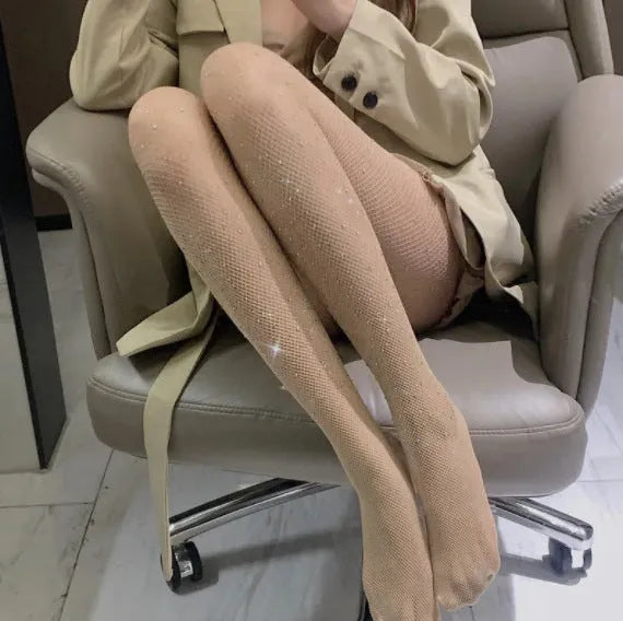 Women's fishnet stockings in thin nylon fabric showing skin, black, and white colour options