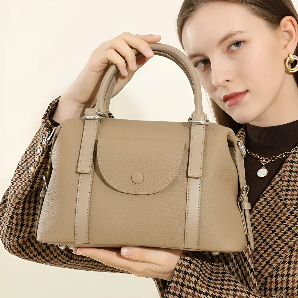 Genuine leather ladies' handbag in elephant grey with contrast stitching and lock detail, 27x12x20cm