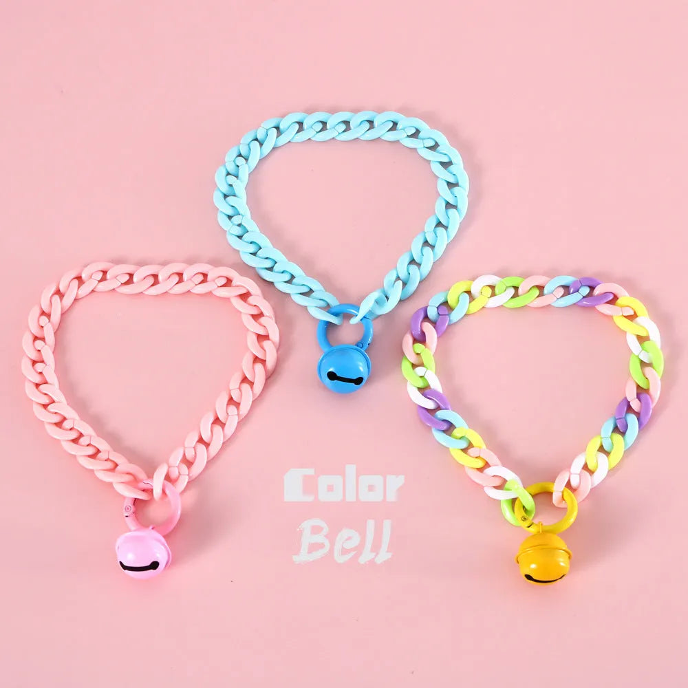 Adjustable pet collar in macaron candy colours with plastic construction and monochrome pattern