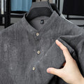 Men's loose fit linen blend shirt with a stand collar in black grey colour.