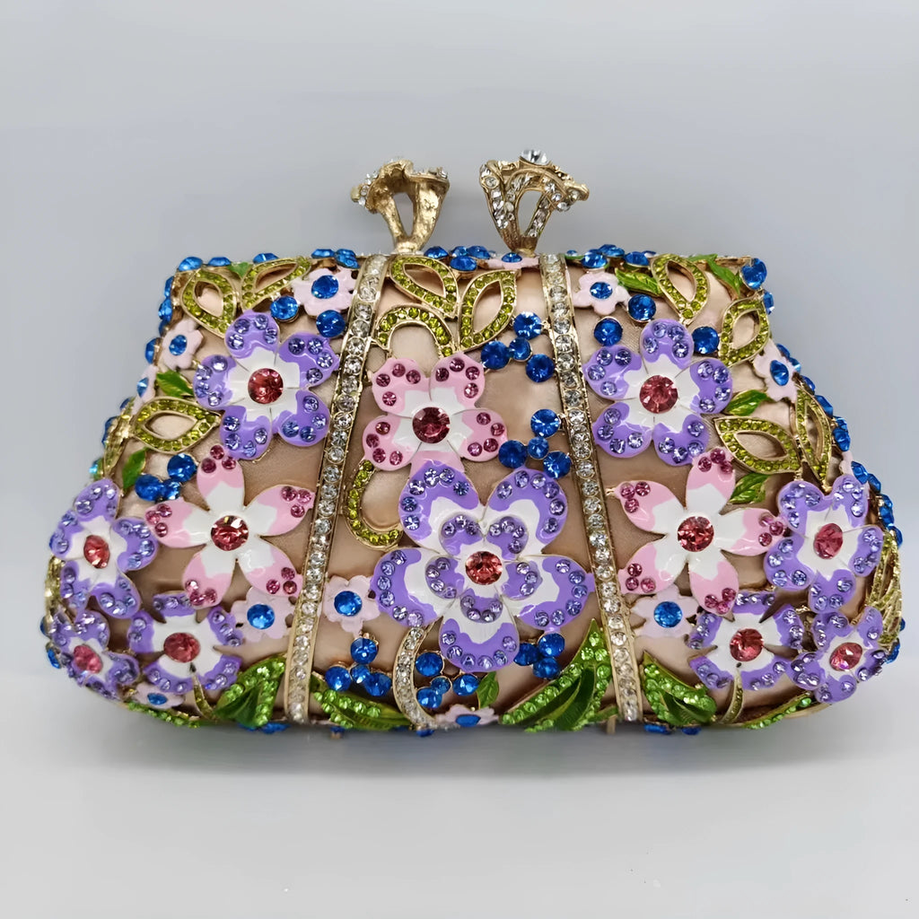 Gold oval metal evening clutch with enamel flower, hollow, diamond and dripping oil detail, 22cm long