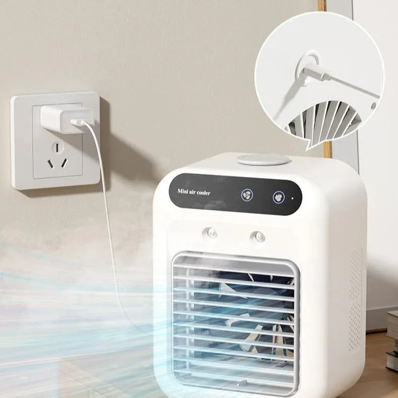 Ivory white portable USB air cooler with water tank and touchscreen controls on desk
