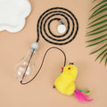 Interactive hanging cat toy with retractable elastic rope and treat reward bulb mounted on door frame