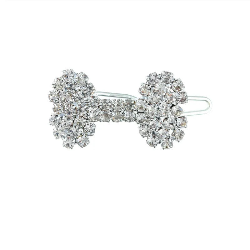 Diamond dog bone pet barrette in size S, shown in white, pink, blue and red for cats and dogs
