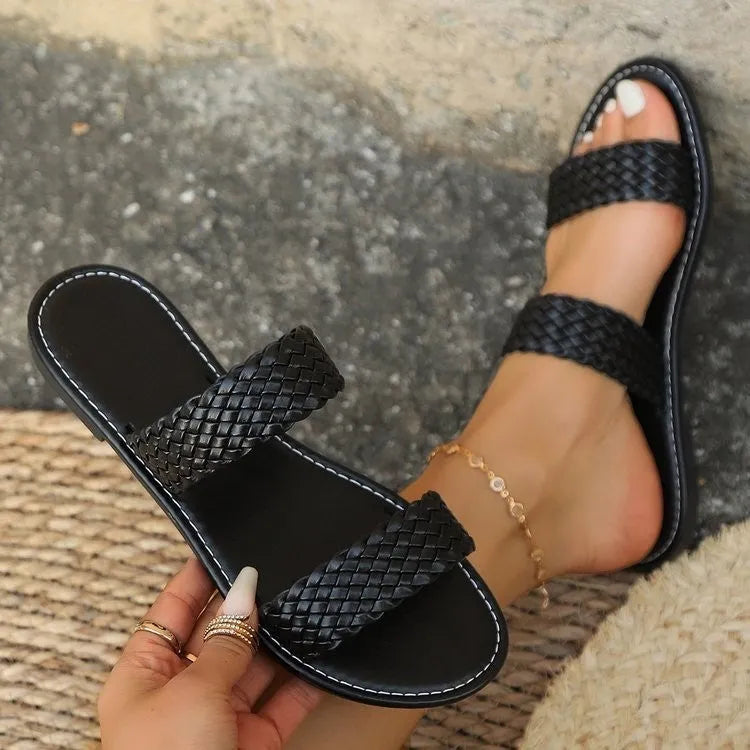 Women's woven beach slipper in gold showing synthetic leather upper and PVC sole, available in UK sizes 36-43.