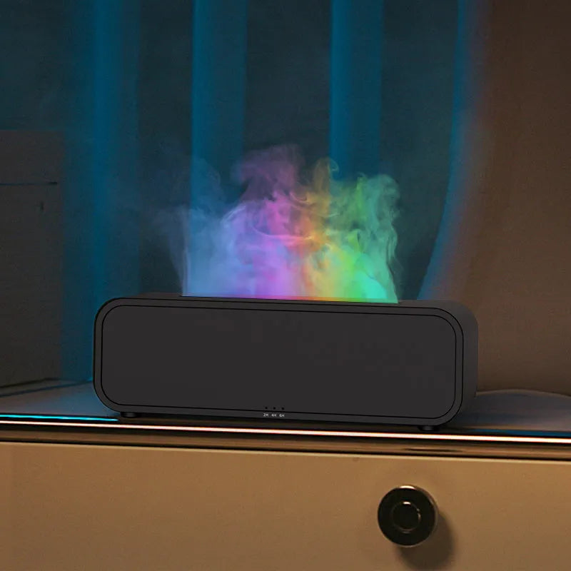 Black and white USB essential oil aroma diffuser with remote control and colour-changing flame light.