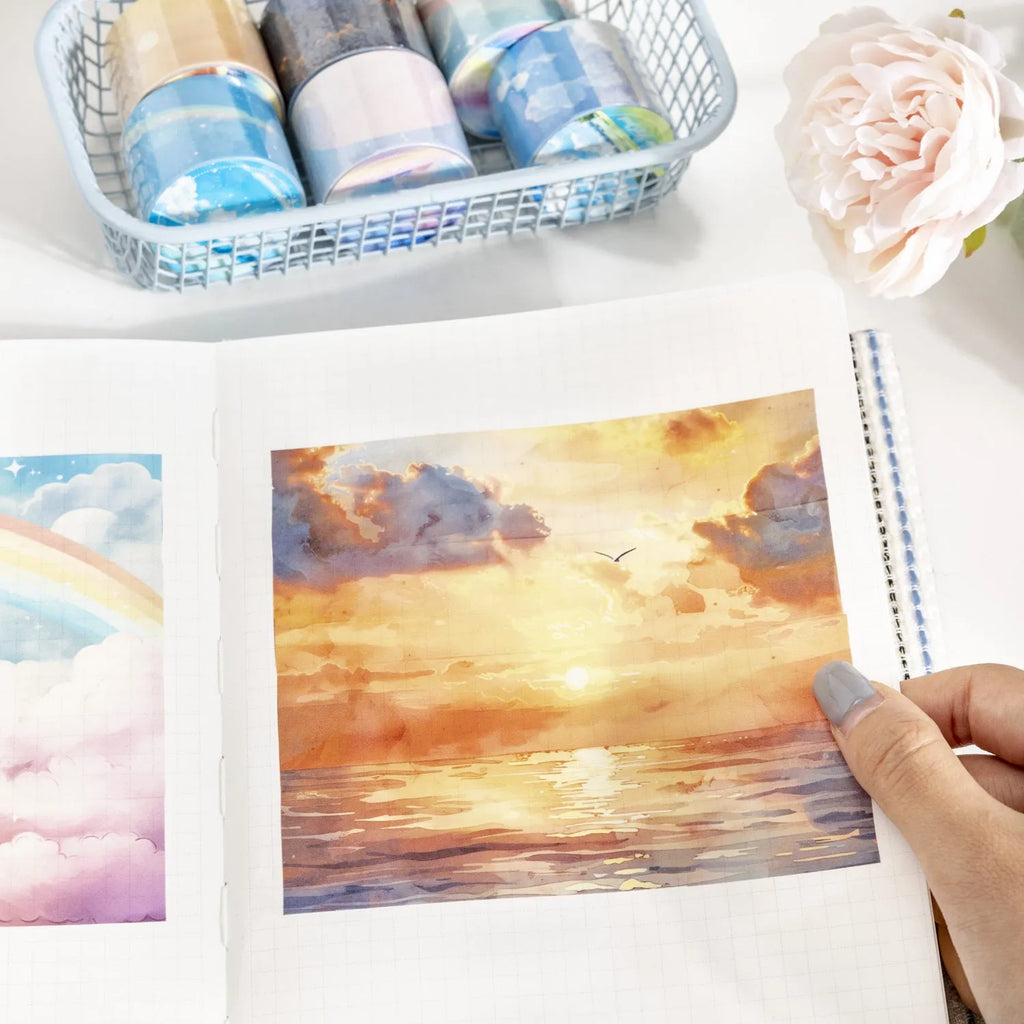 Japanese paper decorative tape roll with sky theme designs showing colourful clouds, twilight, and moonlight sky colour variations