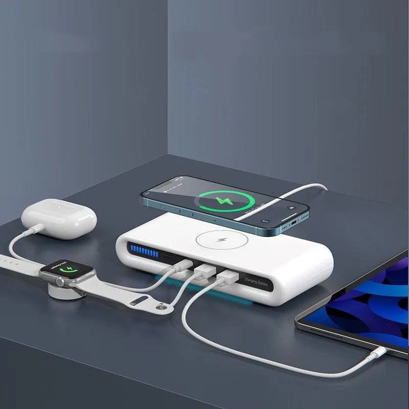 White desktop wireless charging pad with multicolour LED atmosphere lighting and a coiled Type-C cable.