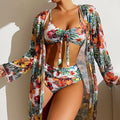 Women's long blouse style plus size bikini swimsuit in loose leisure fit on hanger.