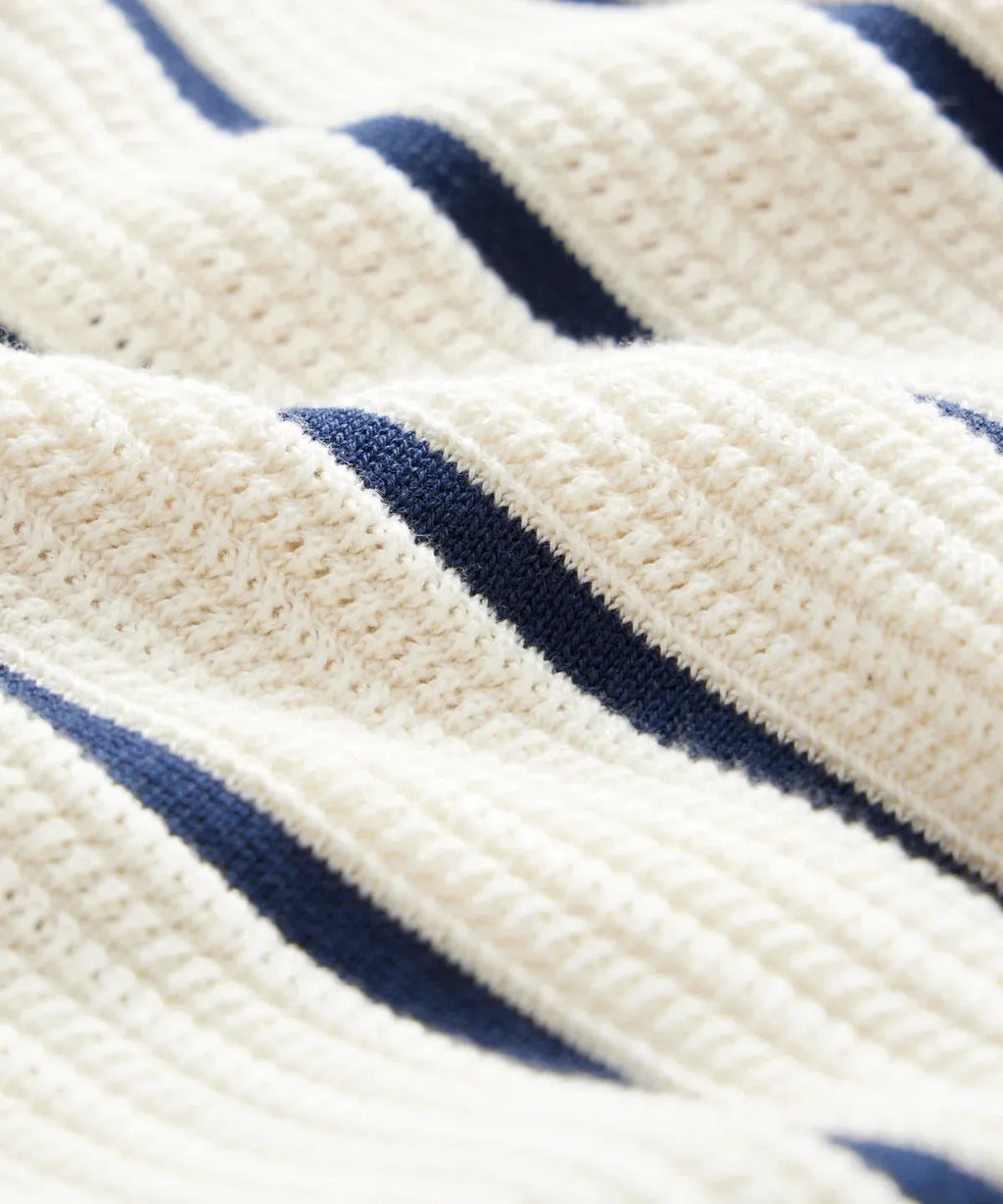 Men's white asymmetric lapel knitted top with short sleeves and striped pattern, made from ice silk and spandex fabric
