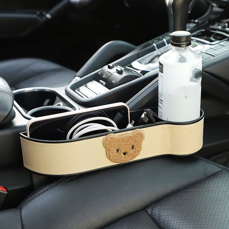 Leather car seat gap storage box with cartoon bear design for organising small items in vehicle