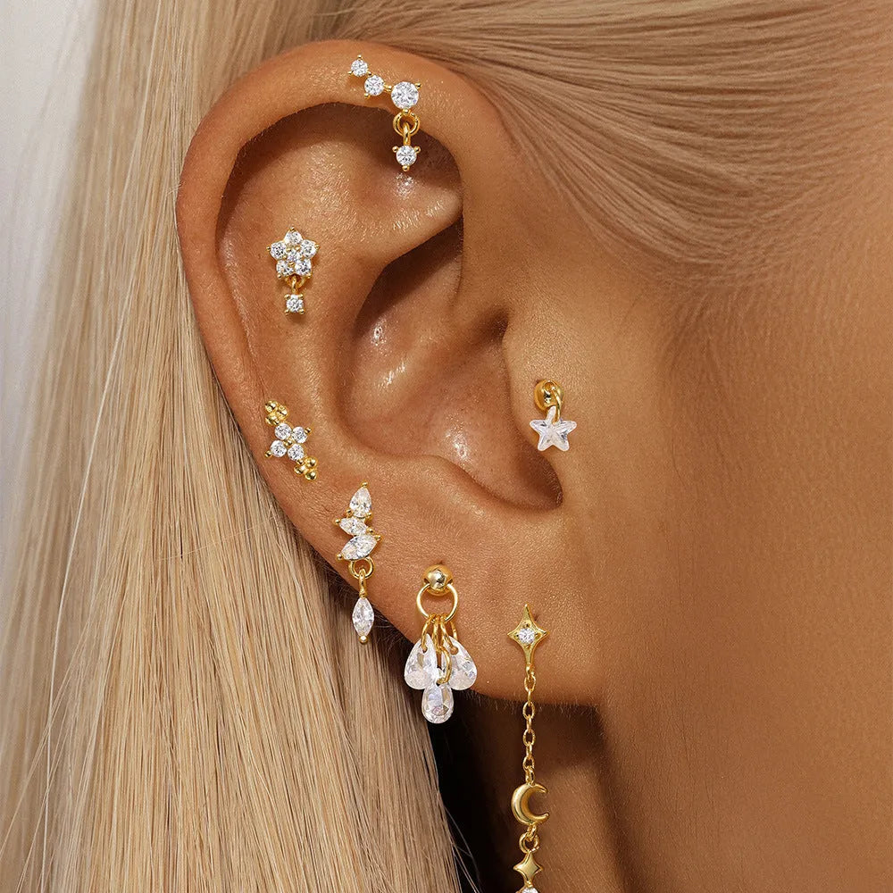 S925 sterling silver geometric star earrings with moon and diamond embedded details in gold plating