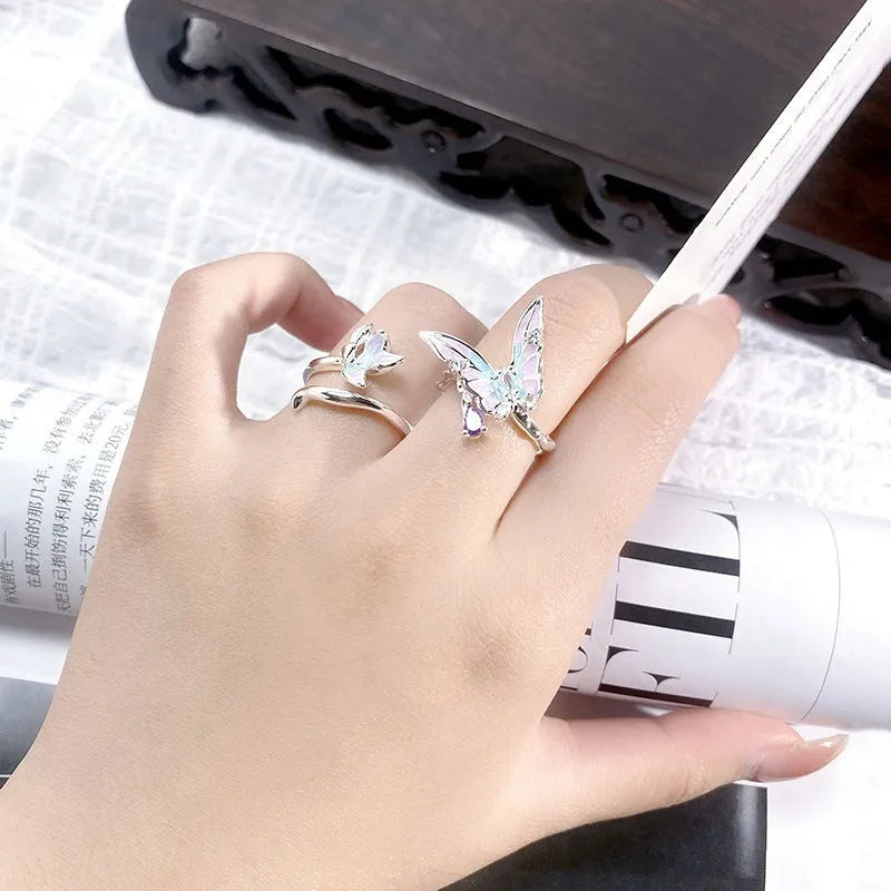 Adjustable copper insect ring showing detailed modelling and dripping oil colour treatment on finger