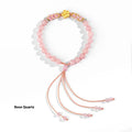 Chinese style hand-woven red rope bracelet with diamond crystal and peach blossom design in pink or red agate.