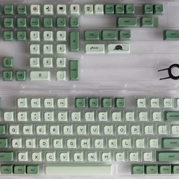 124 Matcha green PBT keycaps with white dye-sublimated legends, arranged in a keyboard layout.