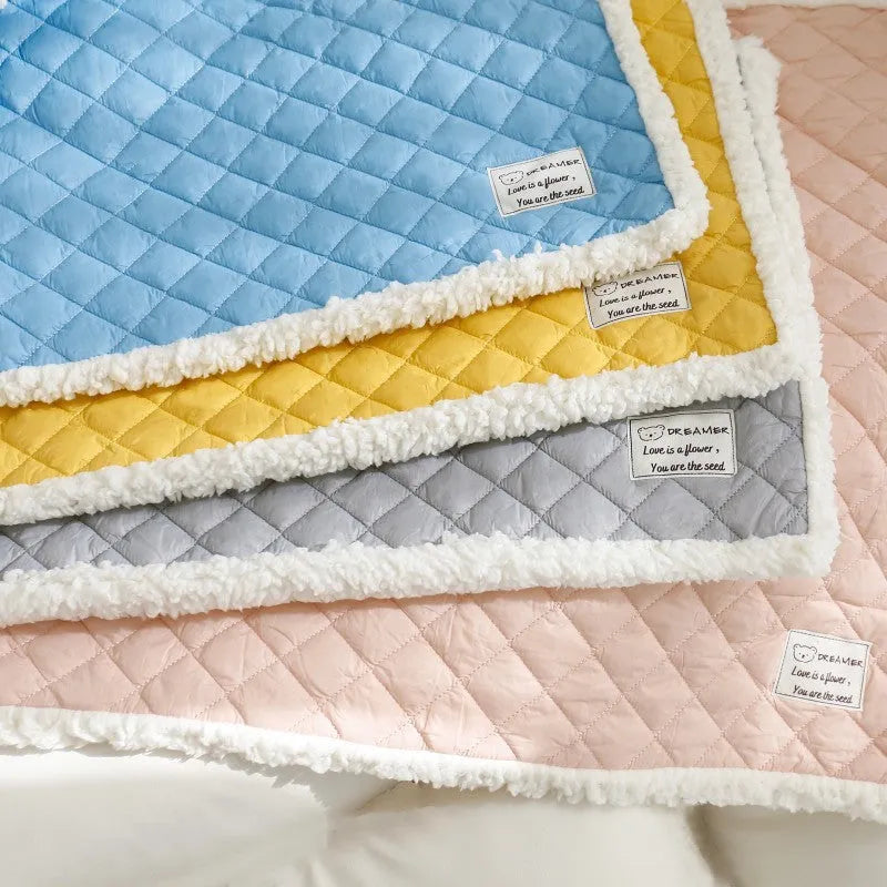 Blue warm terry cloth pet blanket for cats, shown flat with size options M, L, and XL.