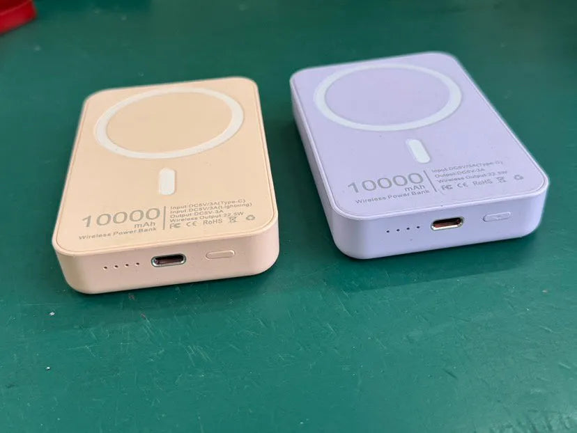 White magnetic wireless charger with 5000mAh power bank showing compact 100x65x16mm dimensions