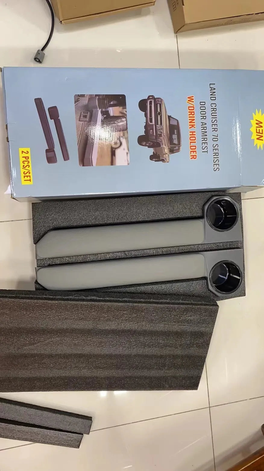 Grey magnetic car armrest door ring frame set showing two pieces for vehicle installation