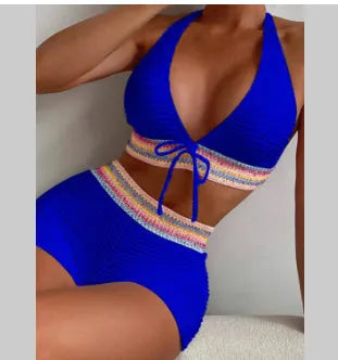 Solid colour blue women's two-piece polyester bikini set on a white background.