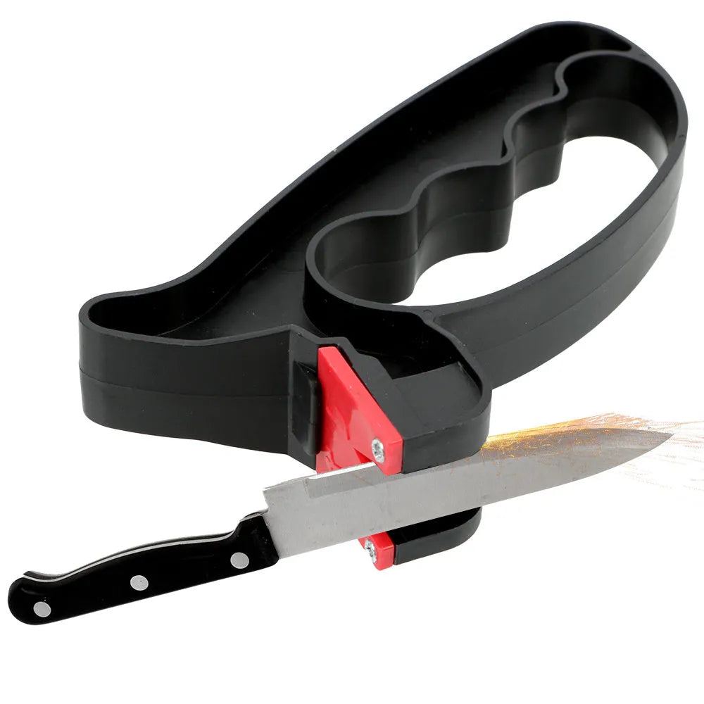 Black handheld tungsten steel knife and scissor sharpener on a kitchen counter