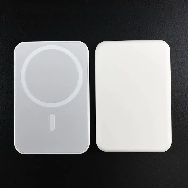 White magnetic wireless charger with 5000mAh power bank showing compact 100x65x16mm dimensions