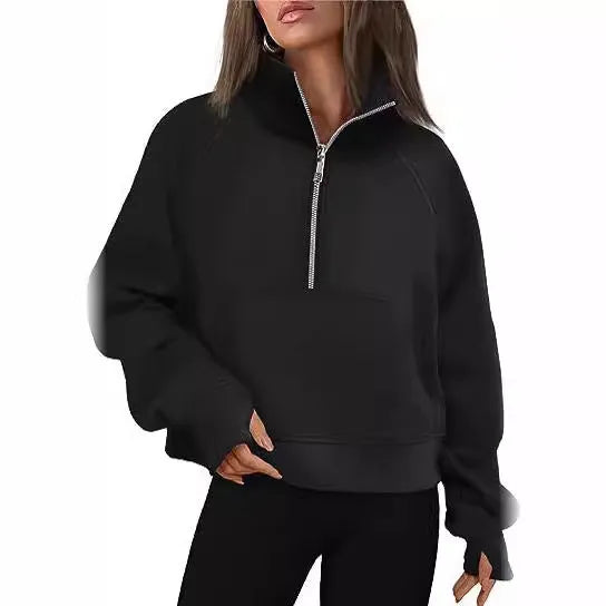 Women's loose fit lapel sweater with fleece lining and long raglan sleeves in a solid colour.