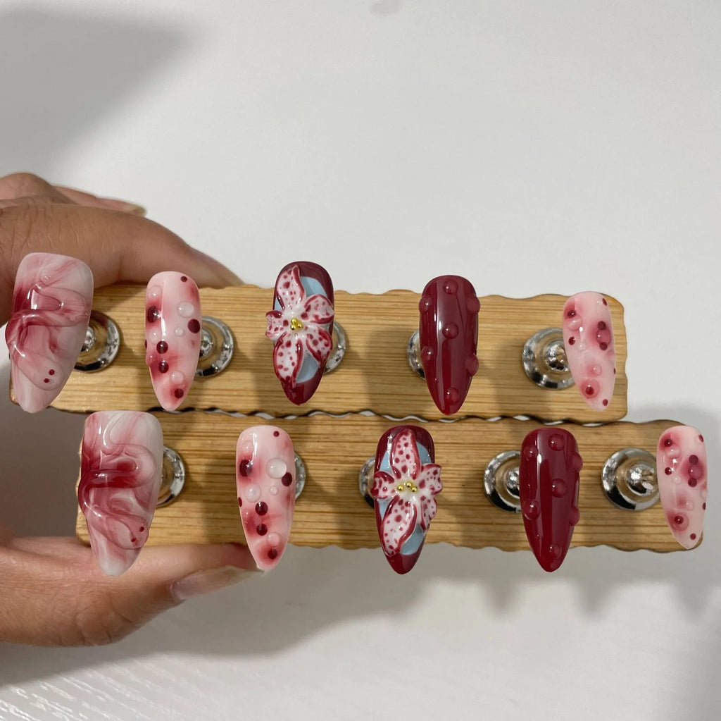 Hand-painted three-dimensional carved almond nail set with rose, tulip, shell patterns in sizes XS, S, M, L