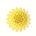 Yellow rubber sunflower-shaped dog chew toy with textured petals.