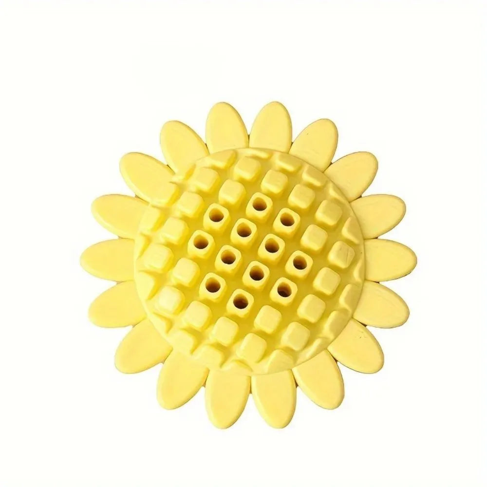 Yellow rubber sunflower-shaped dog chew toy with textured petals.