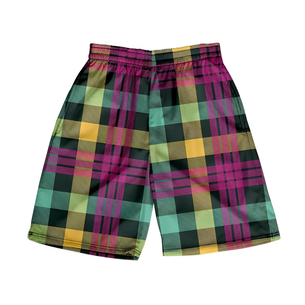 Man wearing grey plaid casual shorts with an elastic waistband, on a beach.