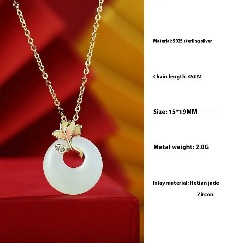Women's S925 sterling silver necklace, bracelet, and earring set with magnolia flower pendant and inlaid Hetian jade.