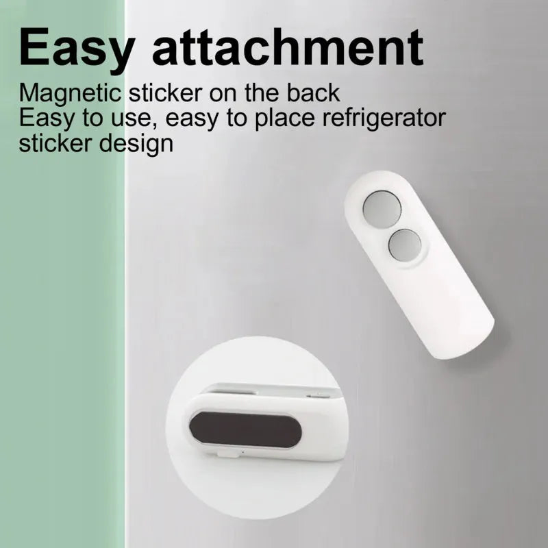 Blue and white handheld USB heat sealer with cutter blade on a magnetic metal surface.