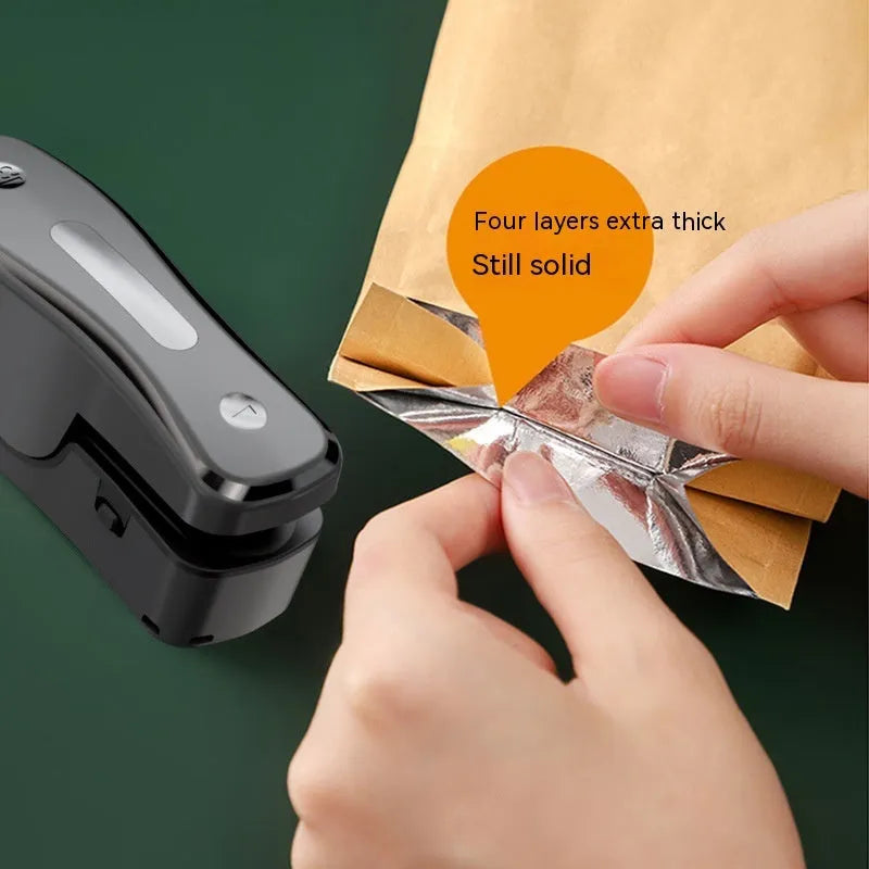Portable USB rechargeable food sealing machine in milky white with magnetic patch