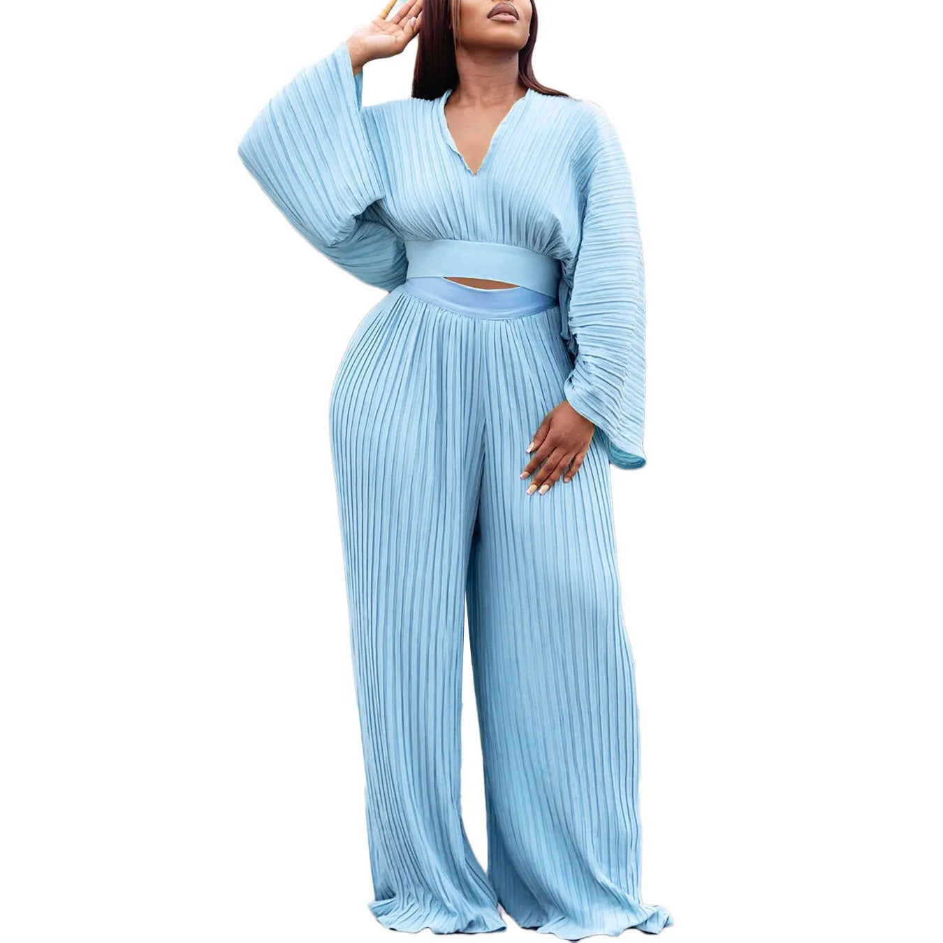 African suit two-piece set featuring a batwing sleeve top and wide-leg trousers in red or sapphire blue.