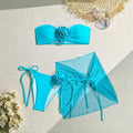 Women's pink tube top swimsuit with three-dimensional flower tie, matching pants, and skirt set for swimming